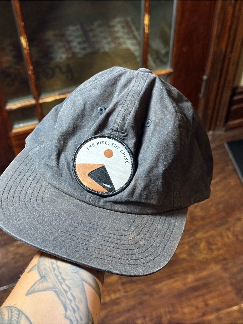 Vuori Dunes Hat Black "The Rise The Shine" Scenic Mountain Design